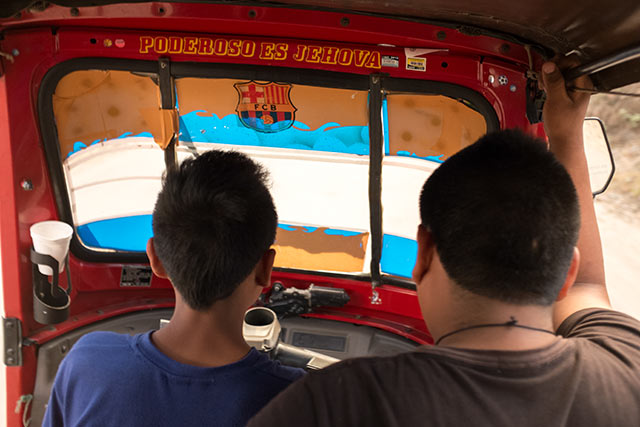 A way too young tuk-tuk driver practising